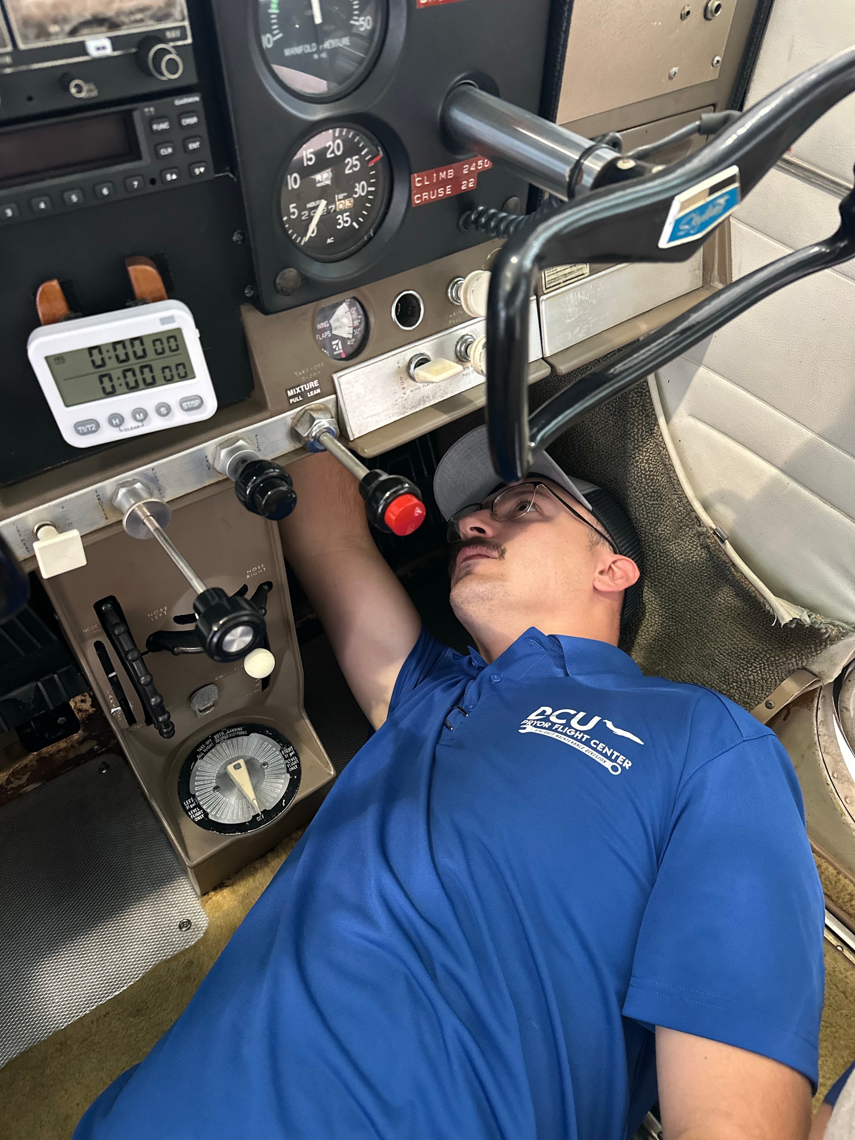 Aircraft cockpit avionics with DCU Flight Center technician